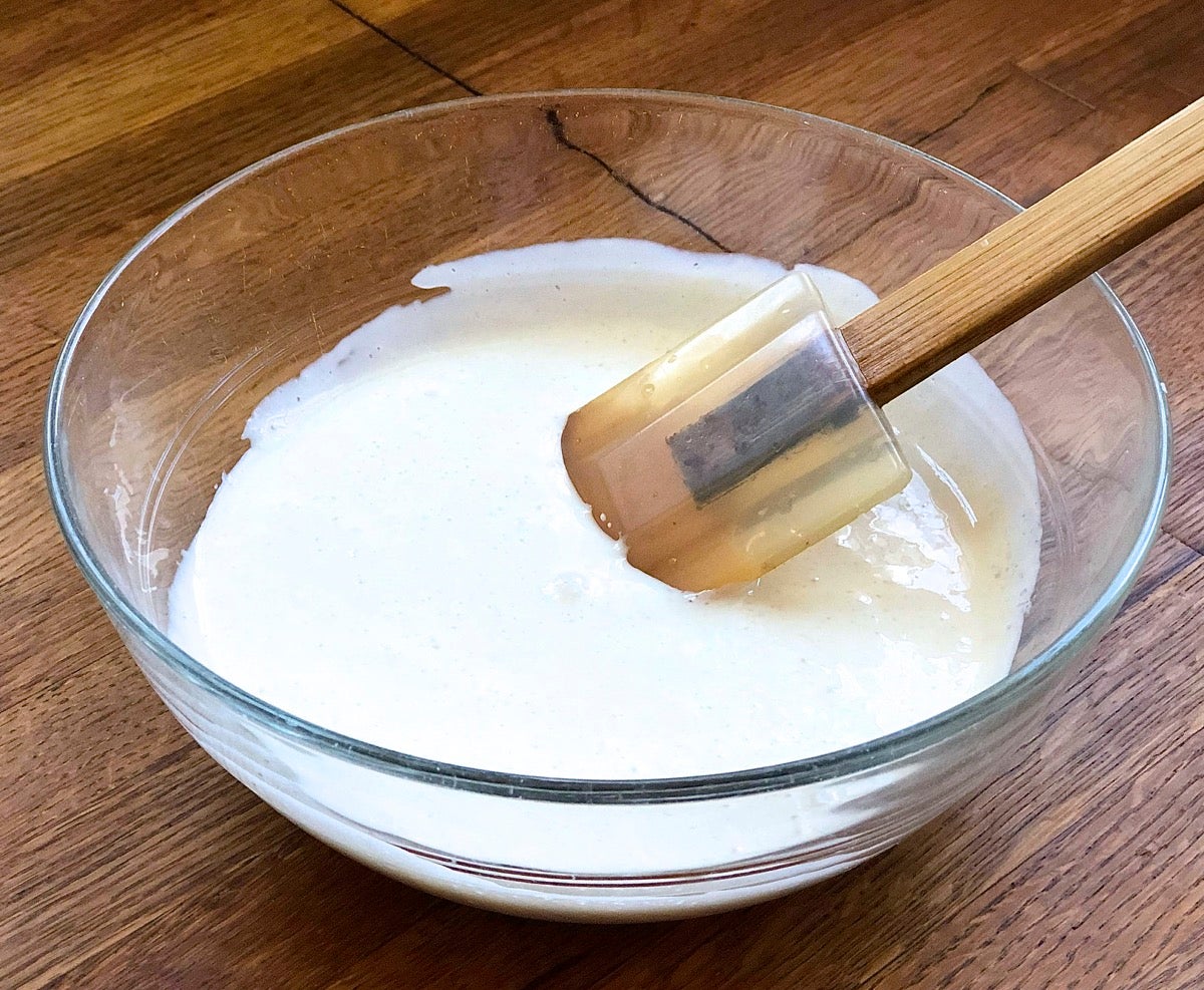 1 cup sourdough starter in a glass bowl.